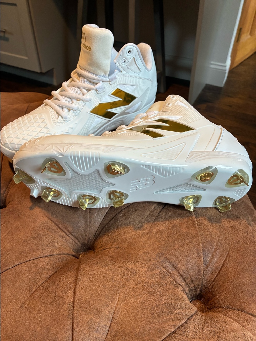 New Balance White and Gold Baseball Cleats